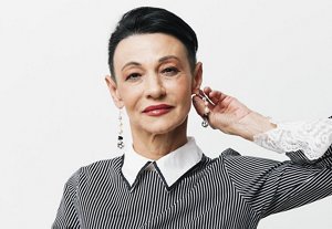 Flamboyant older woman with a styled tapered crop haircut